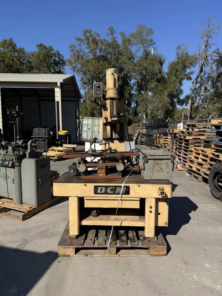 Front view of used DMC valve seat and guide machine